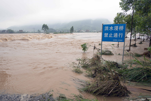 5月20日拍攝的被洪水侵襲的廣西桂林市永?？h永福鎮南雄村。新華社發（李忠波 攝）